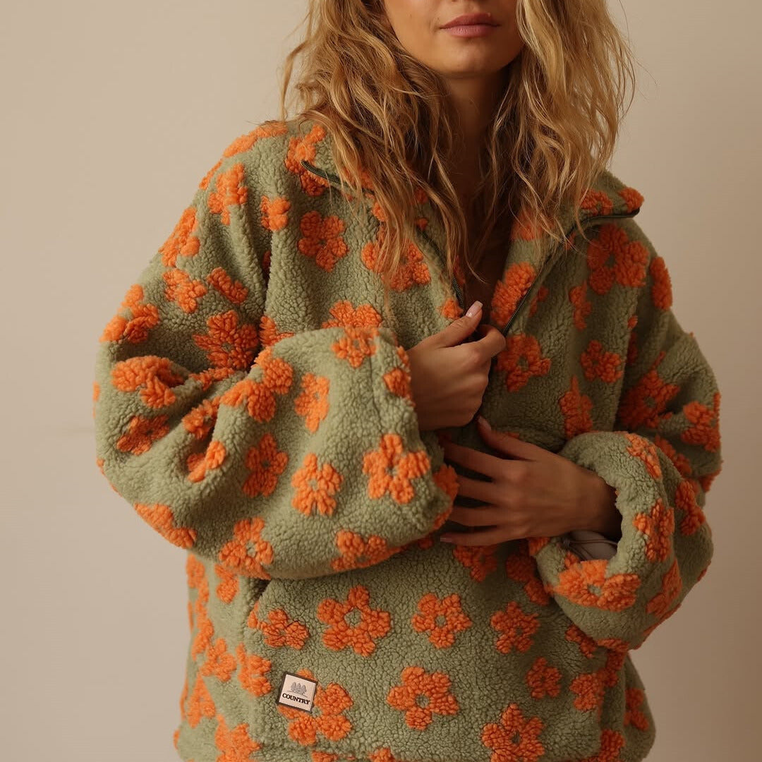 Isabela – Blød varme med blomster