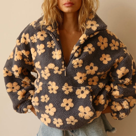 Isabela – Blød varme med blomster